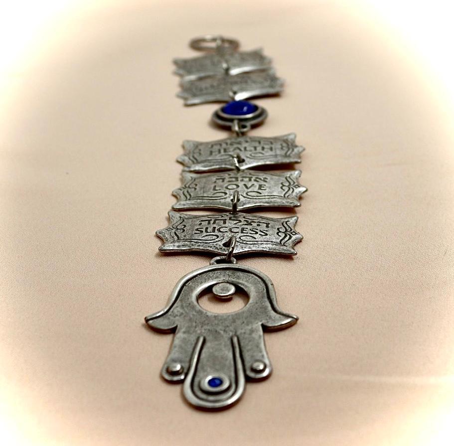 5 blessing in Hebrew and English with hamsa and blue eye against the evil eye.