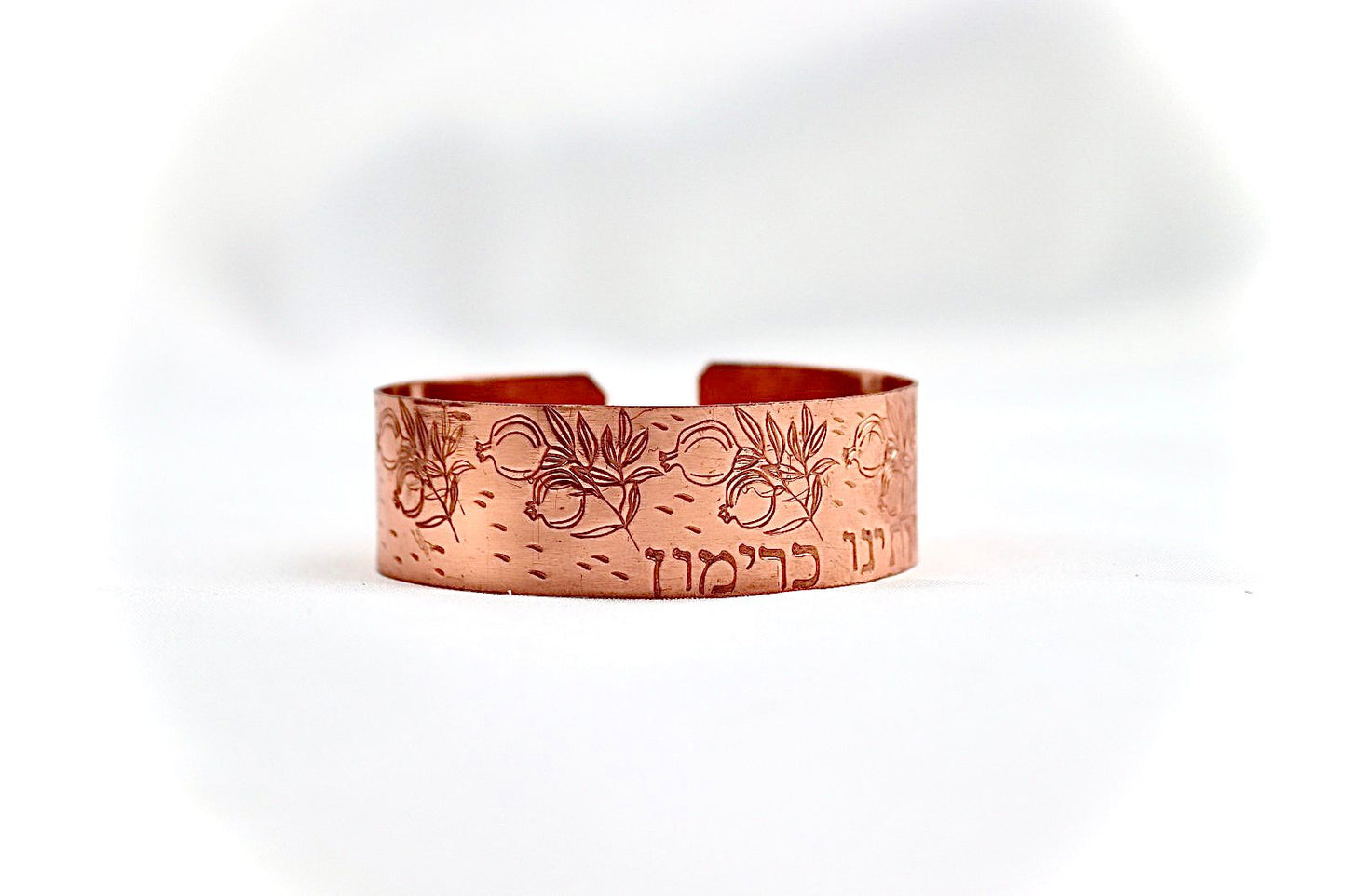 copper bracelet with pomegranate and blessing in Hebrew
