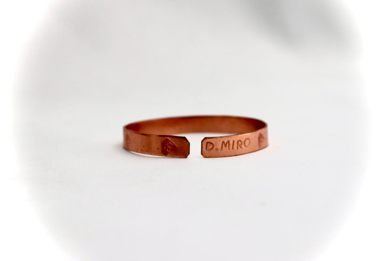 copper bracelet with a diamond shaped