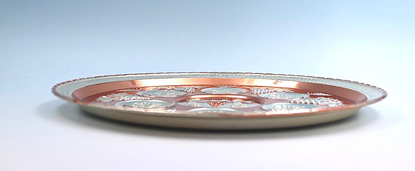 copper and silver Passover seder plate