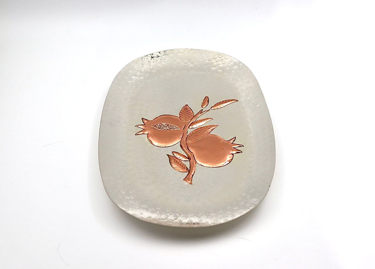 A unique handwork on copper with silver of pomegranates
