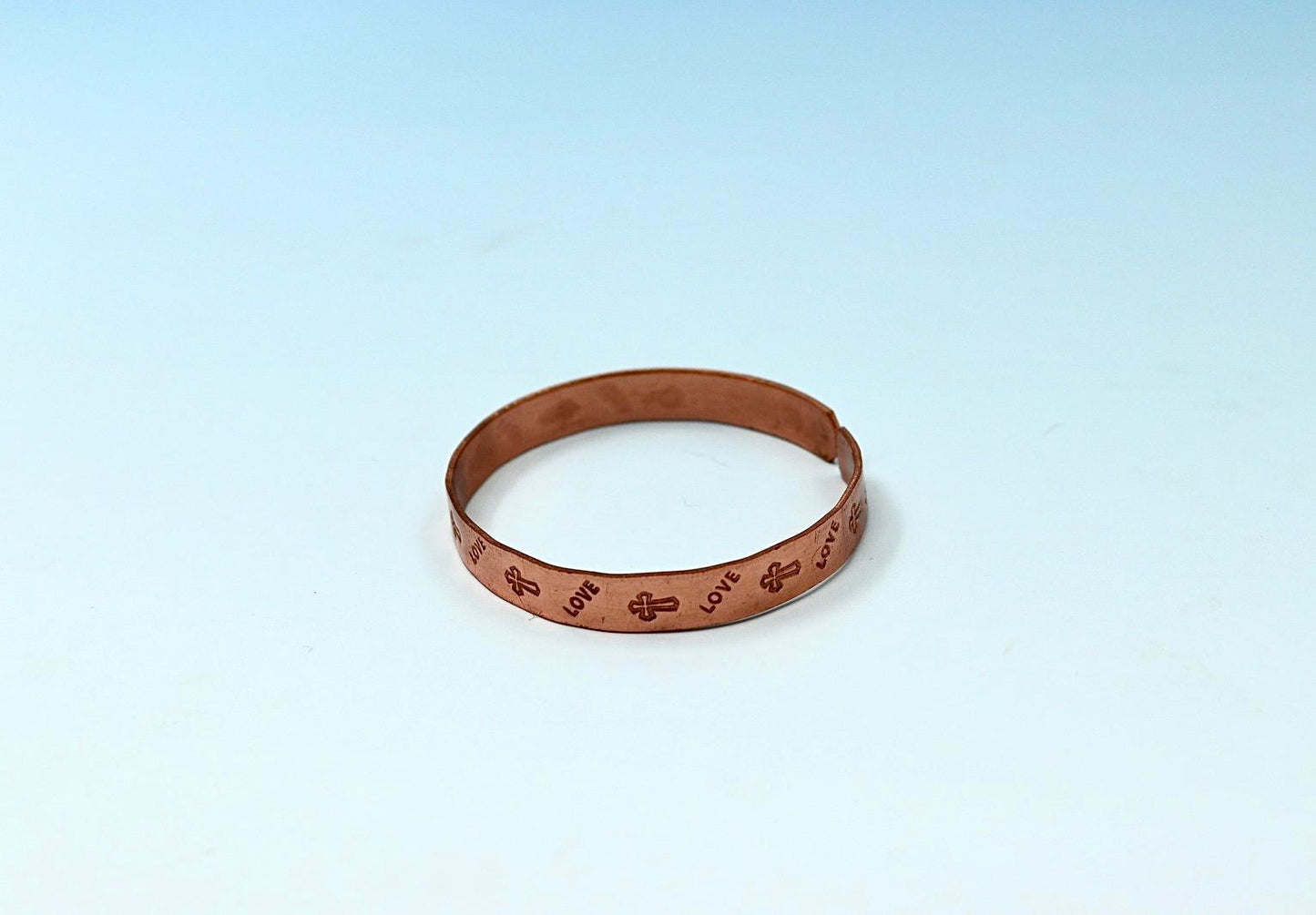 copper bracelet with cross