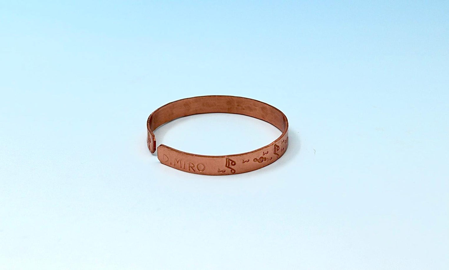 copper bracelet with music notes