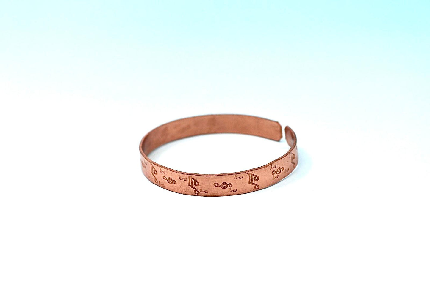 copper bracelet with music notes
