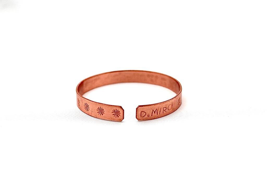 copper bracelet with:״Hear O Israel, the Lord our God the Lord is One״ in Hebrew