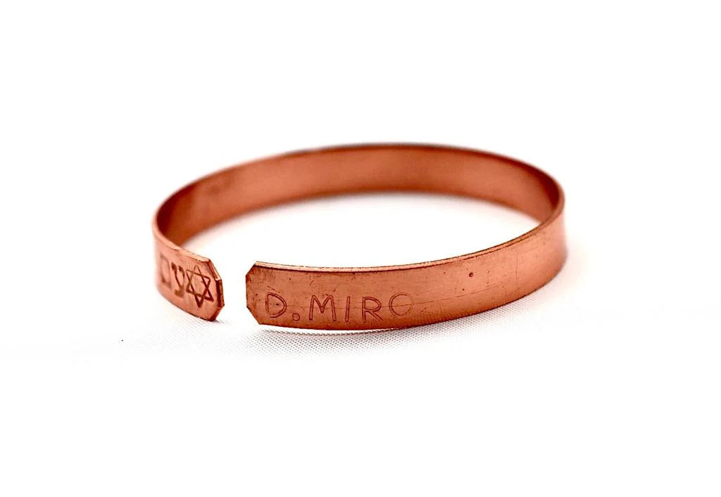 copper bracelet with ״the nation of Israel lives״
