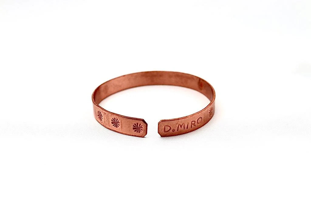 copper bracelet with: ״I am for my beloved and my beloved is for me״ in Hebrew"