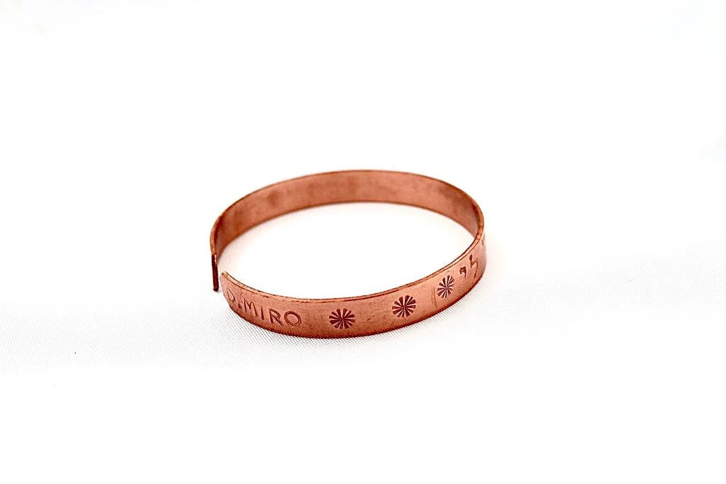 copper bracelet with: ״I am for my beloved and my beloved is for me״ in Hebrew"