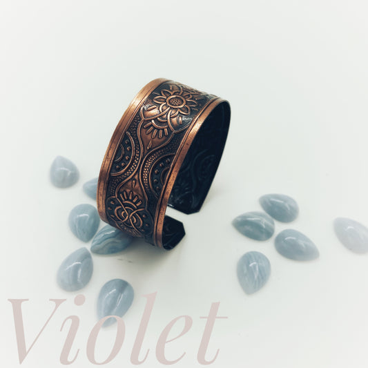 copper bracelet with oxidation