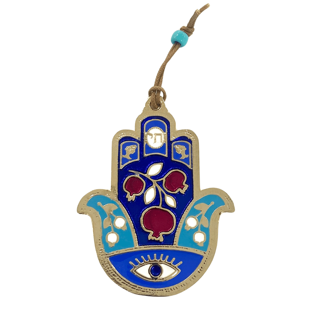 Hamsa designed with pomegranate and an eye against the evil eye