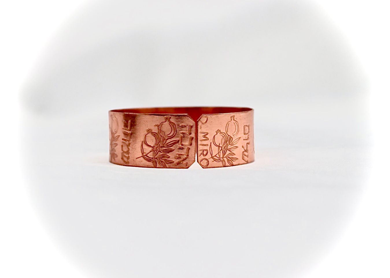 copper bracelet with pomegranate and blessing in Hebrew