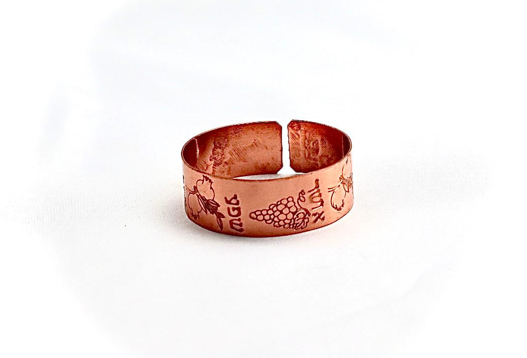 copper bracelet with seven species