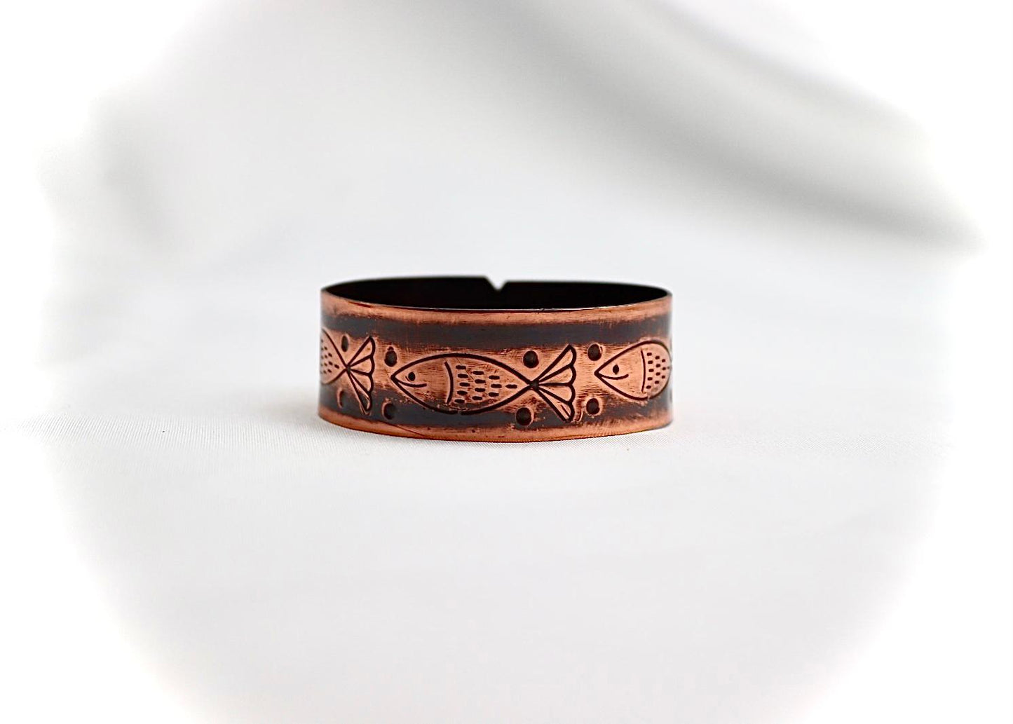 copper bracelet with fish