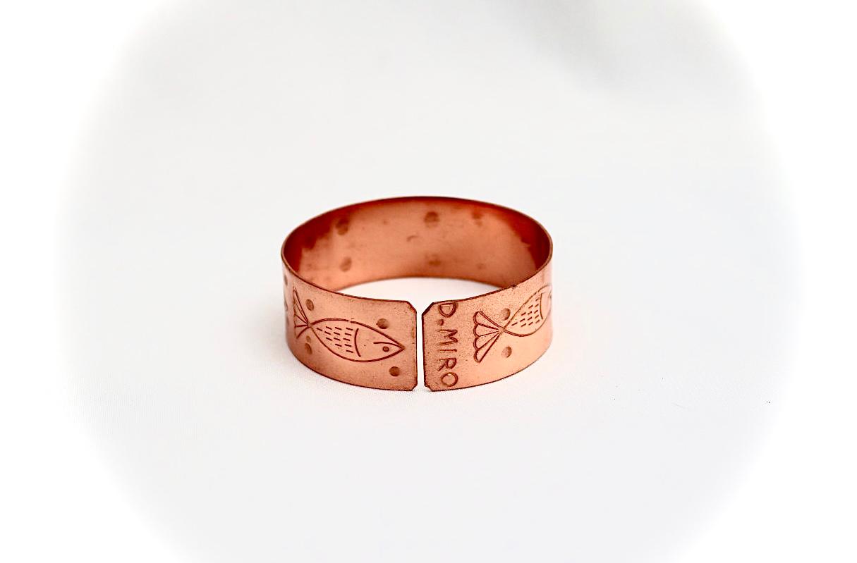 copper bracelet with fish