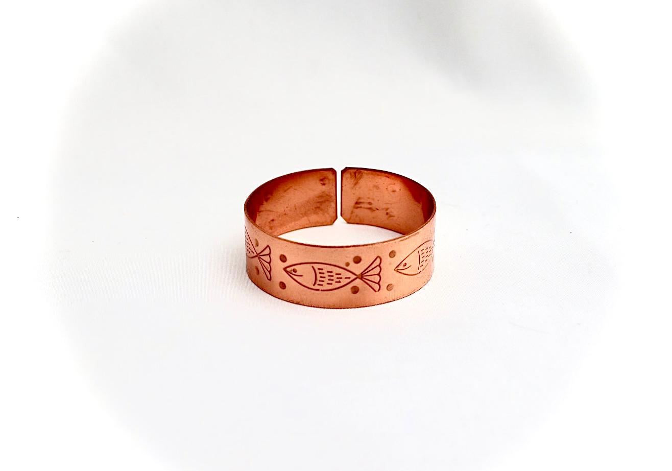 copper bracelet with fish