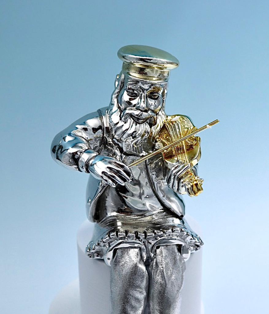 A seated Hasidic playing a violin, made of electroformed silver plating and gold plating.