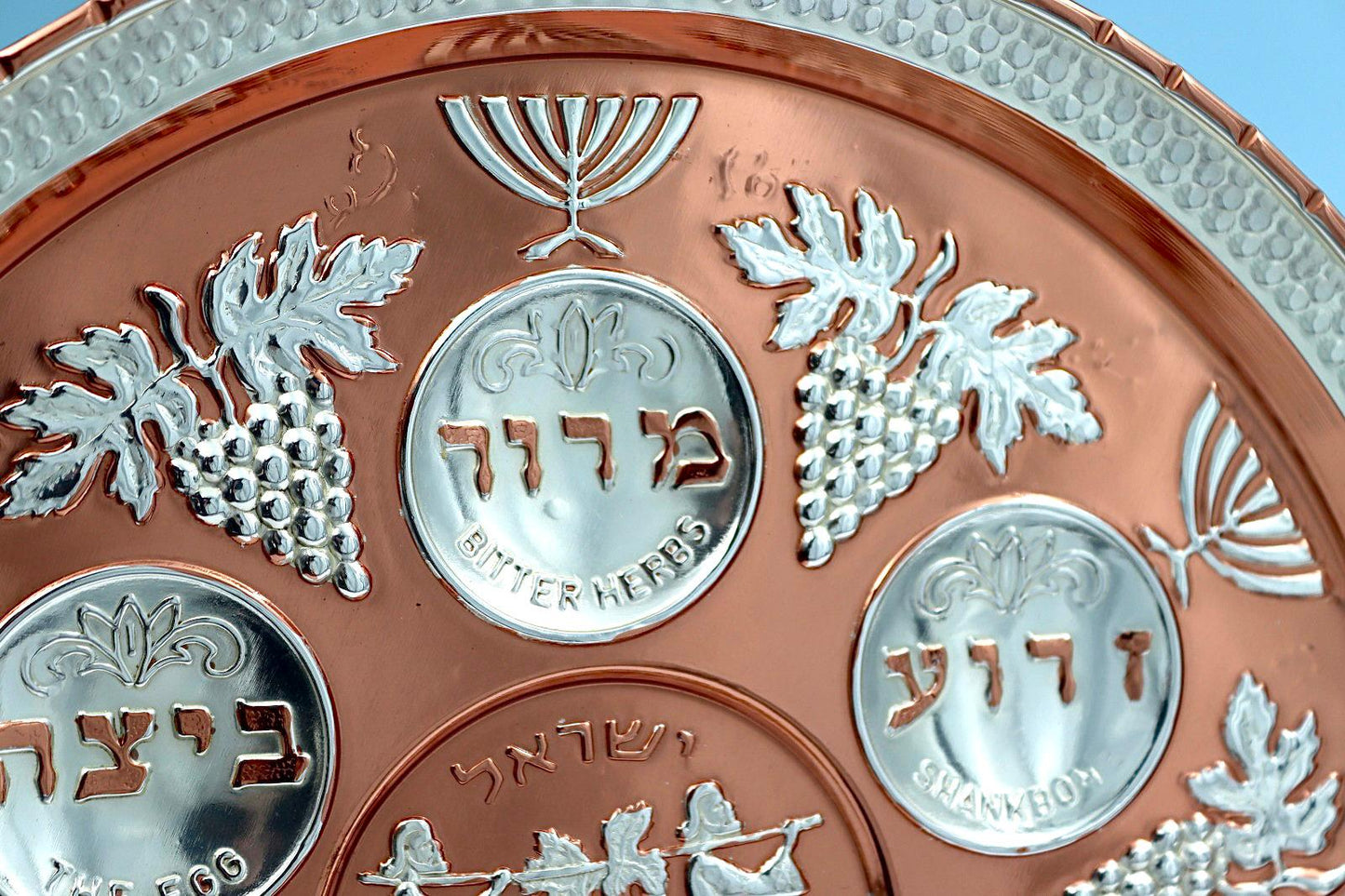 copper and silver Passover seder plate