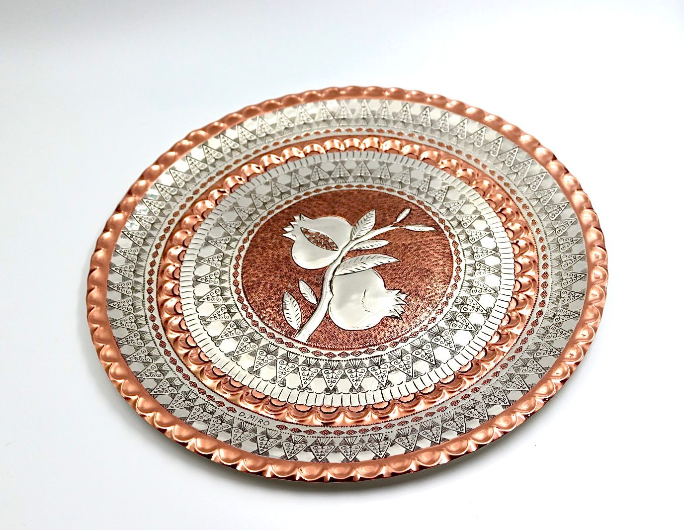 A unique handwork on copper with silver of pomegranates