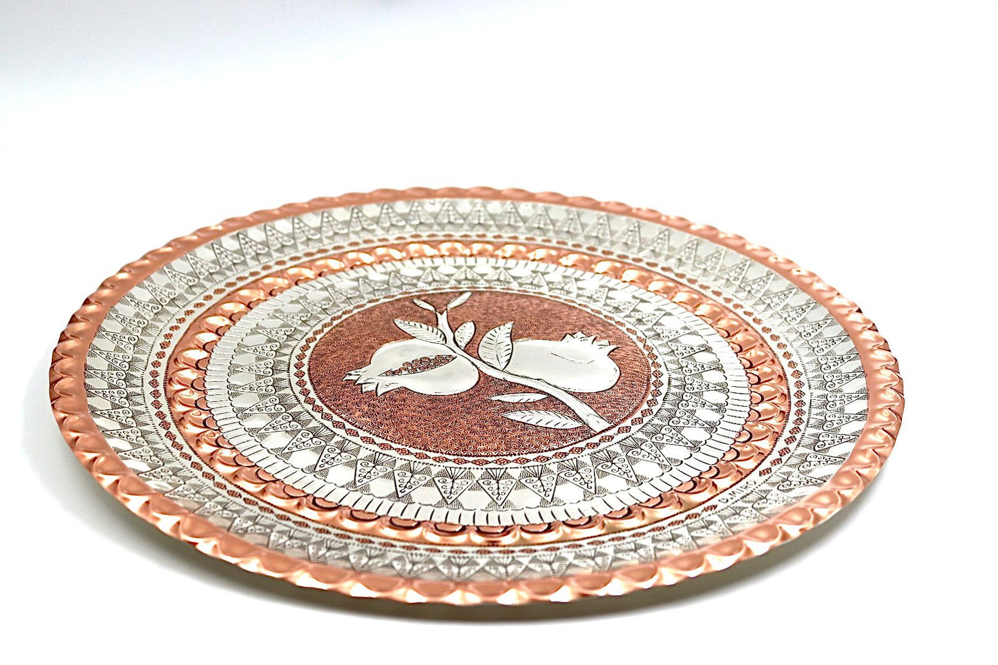 A unique handwork on copper with silver of pomegranates