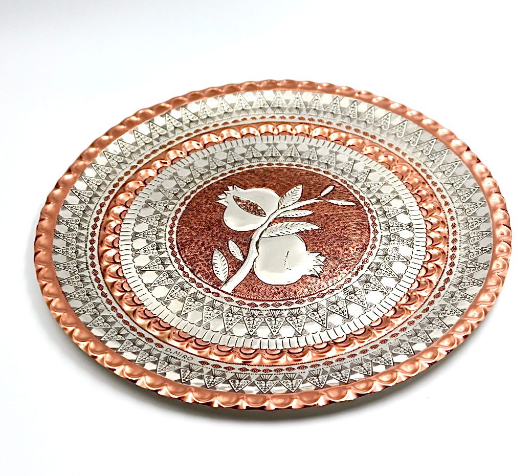 A unique handwork on copper with silver of pomegranates