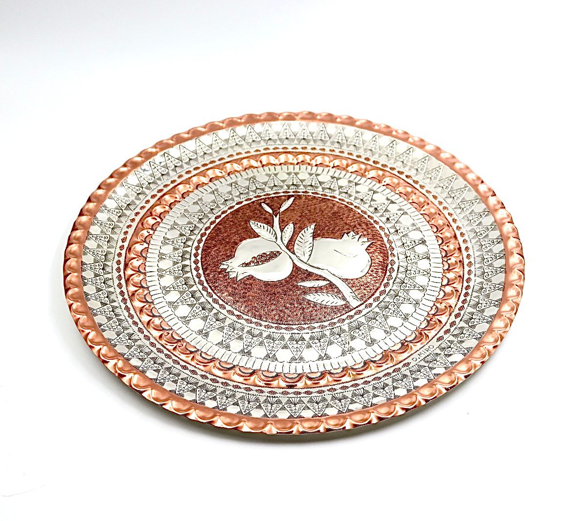 A unique handwork on copper with silver of pomegranates