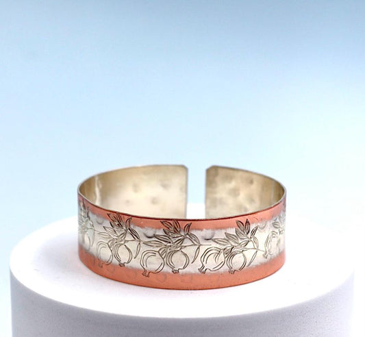 copper bracelet with silver engraved with pomegranates