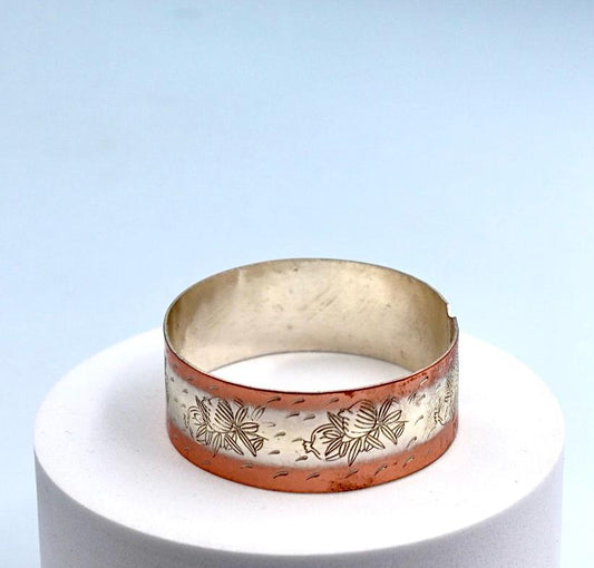 copper bracelet with silver engraved with pomegranates