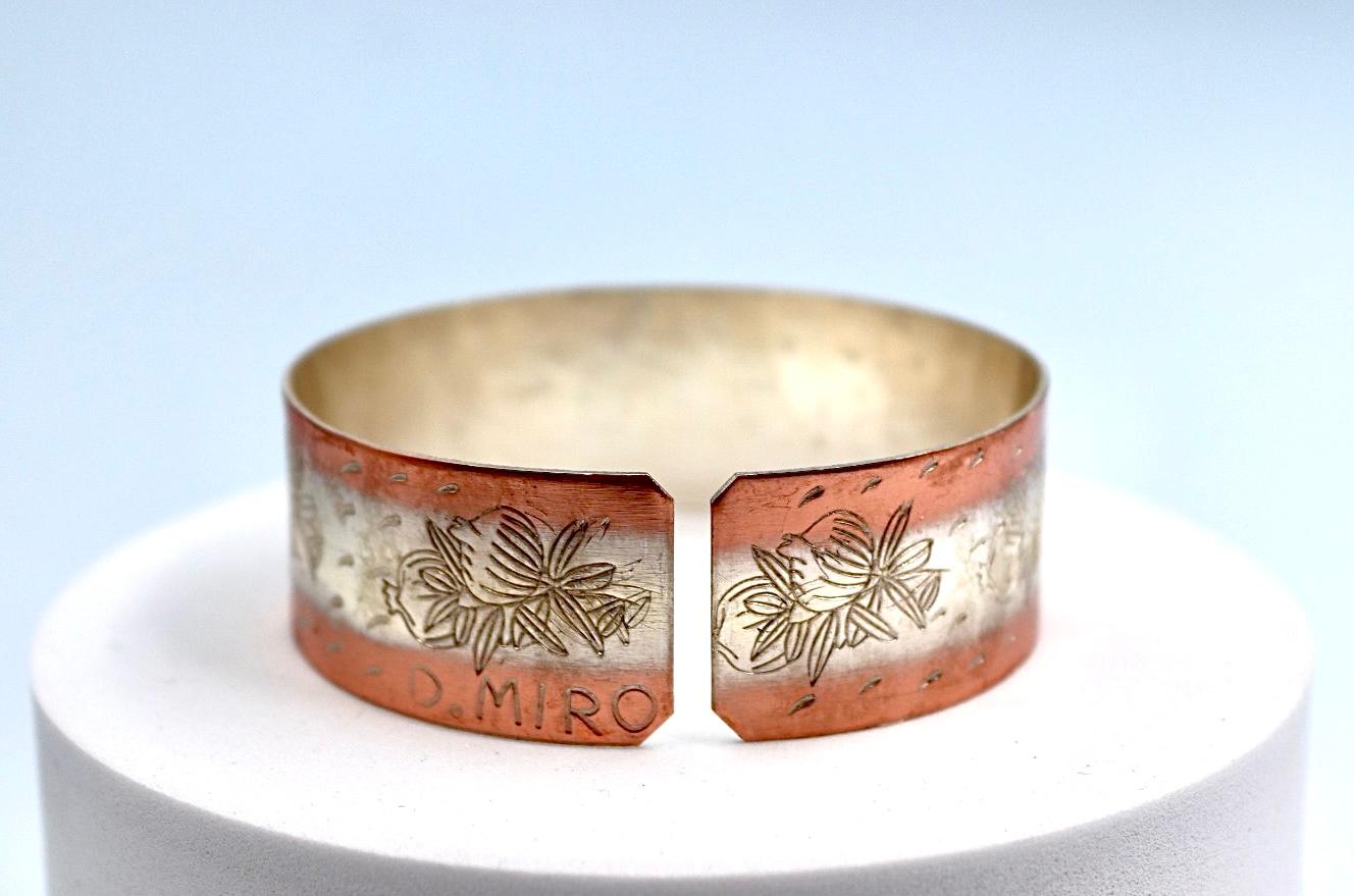 copper bracelet with silver engraved with pomegranates