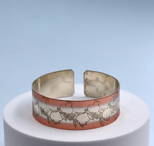 copper bracelet with silver engraved with pomegranates