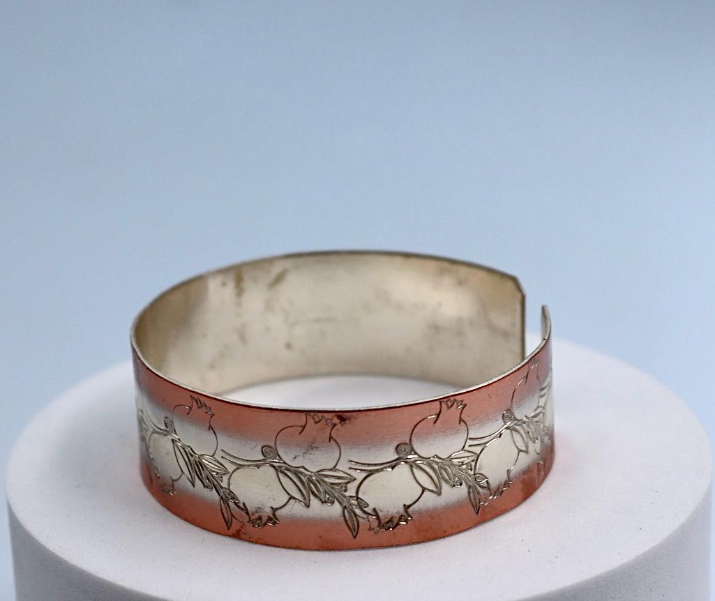 copper bracelet with silver engraved with pomegranates