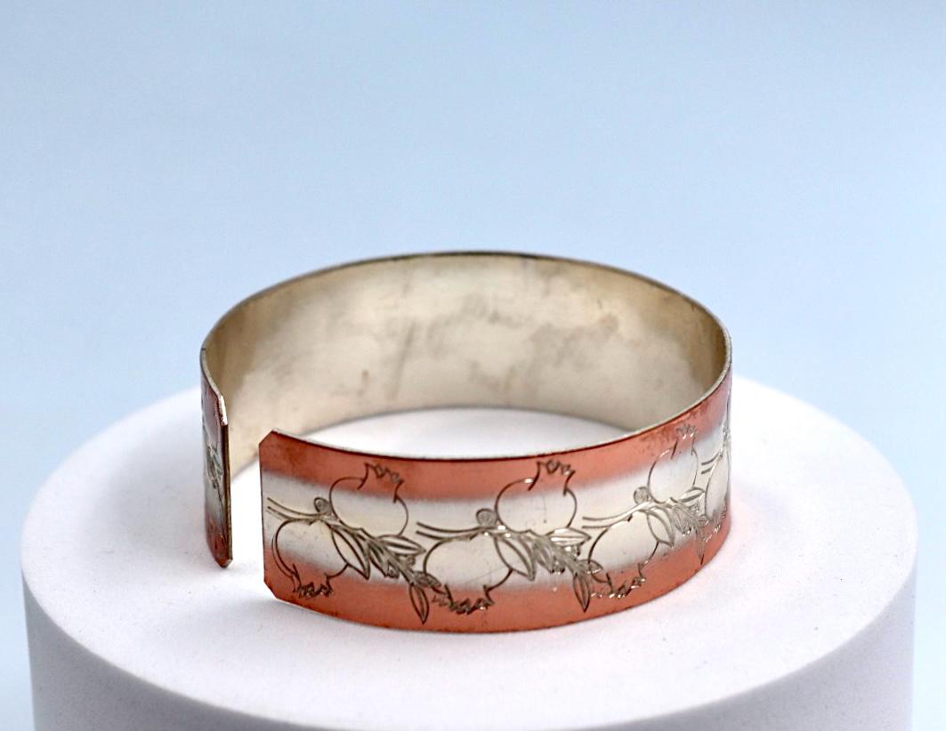 copper bracelet with silver engraved with pomegranates