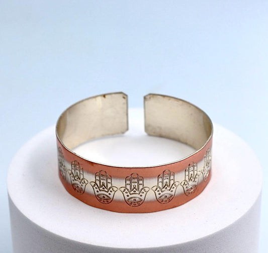 copper bracelet with silver engraved with Hamsa