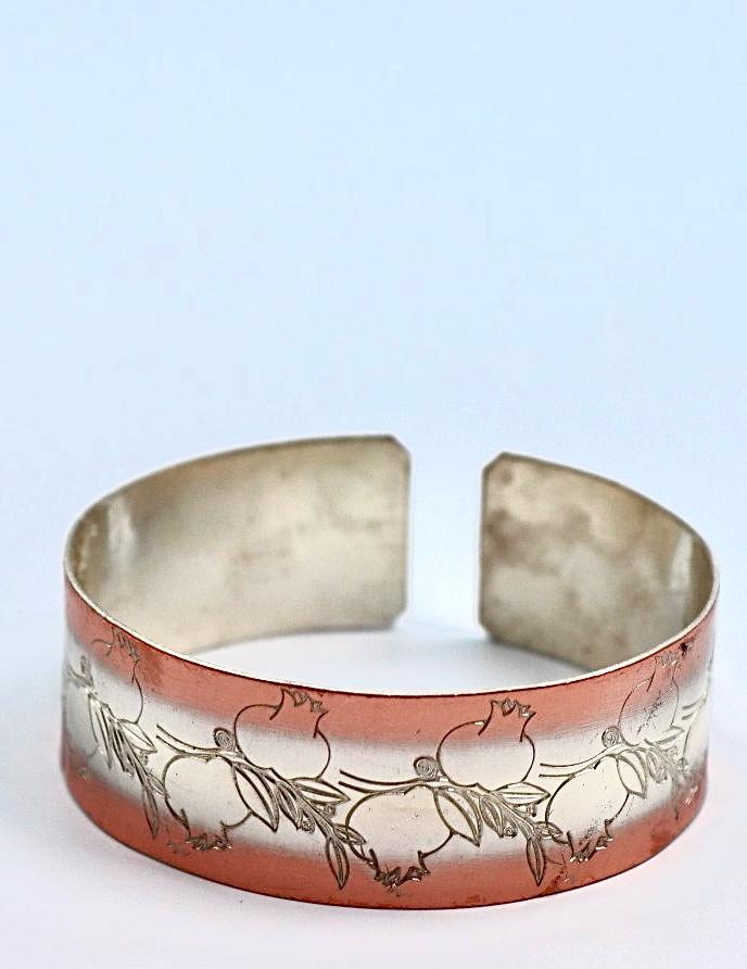 copper bracelet with silver engraved with pomegranates