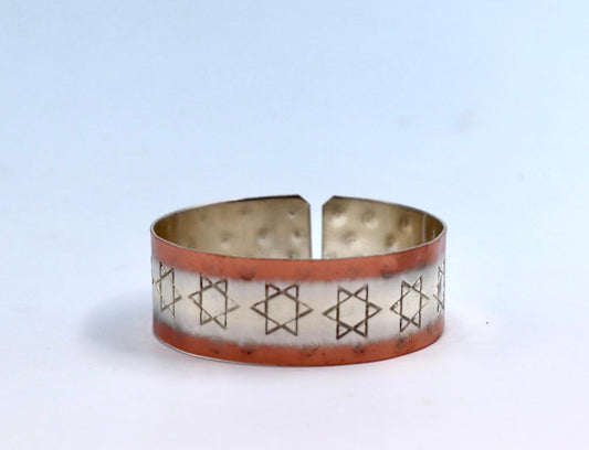 copper bracelet with silver engraved with Star of David .