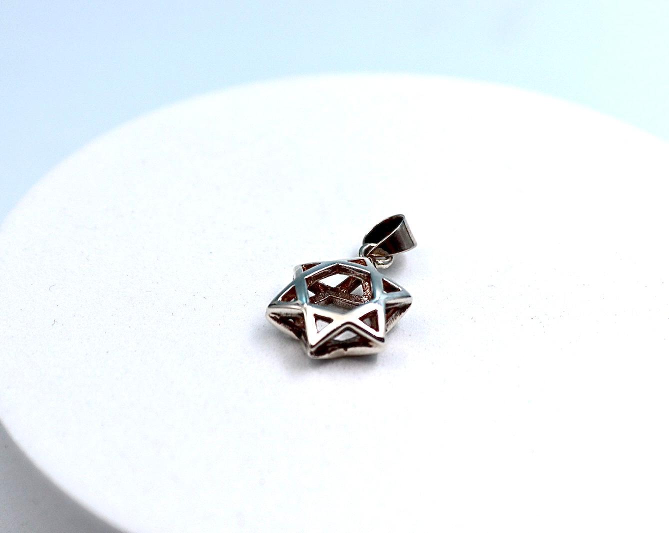 Silver Star of David pendant.