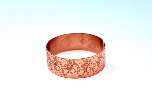 copper bracelet with pomegranate