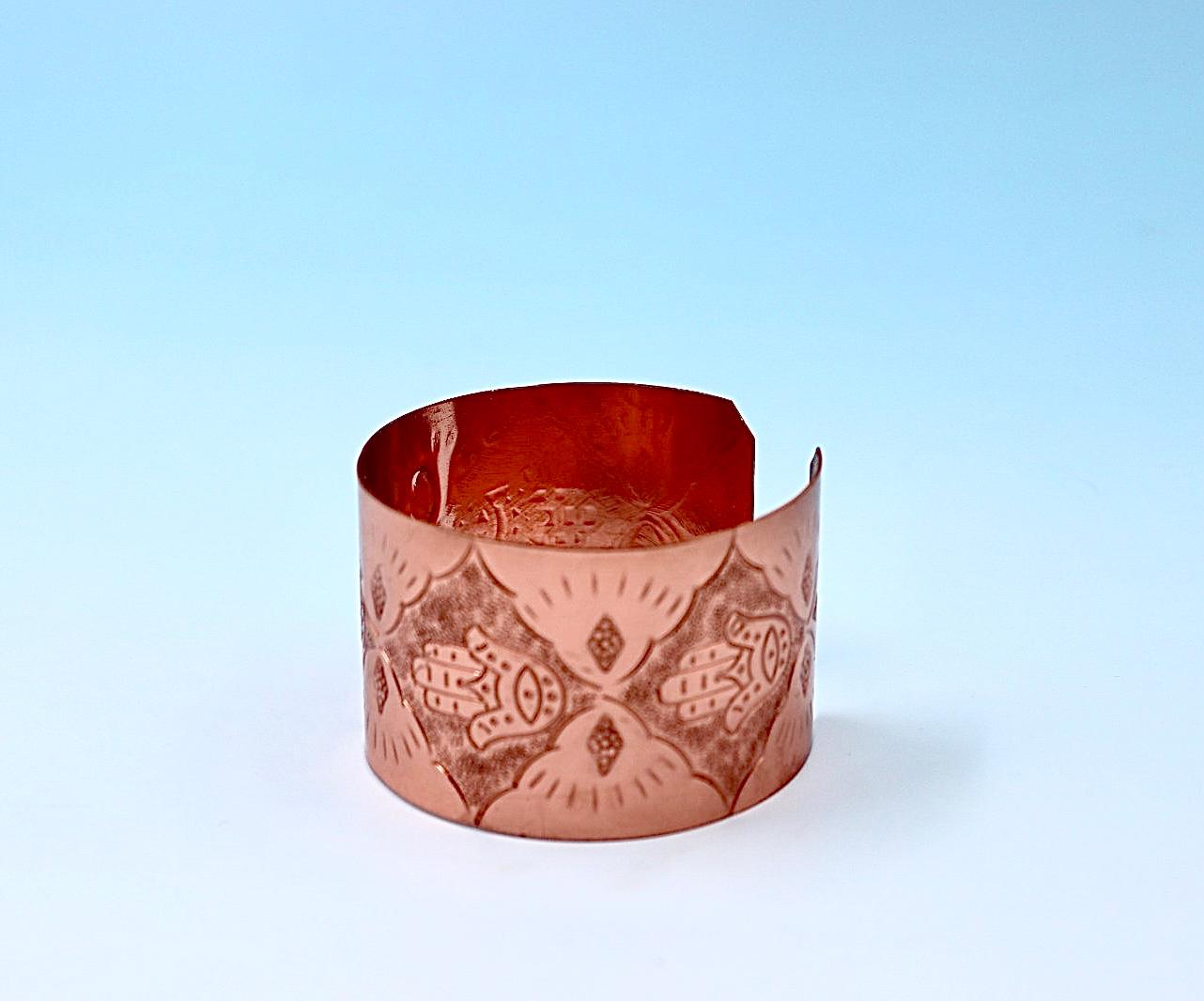 copper bracelets with Hamsa