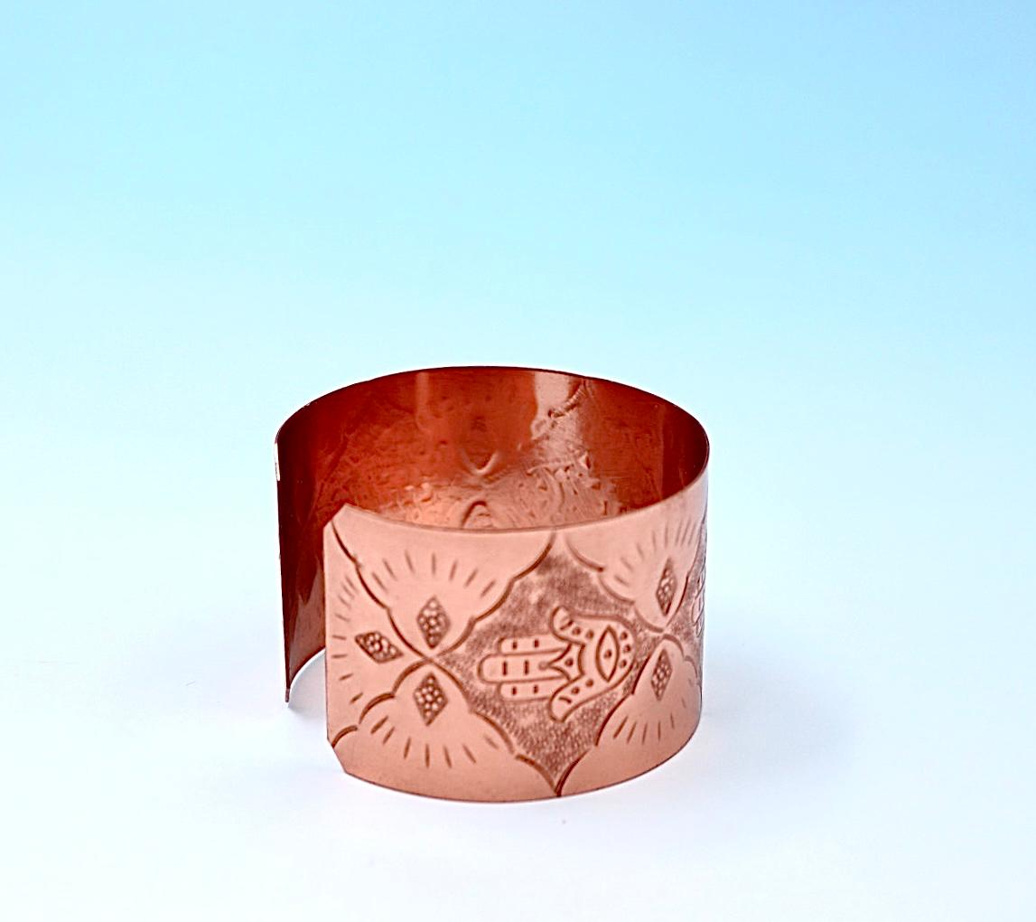 copper bracelets with Hamsa