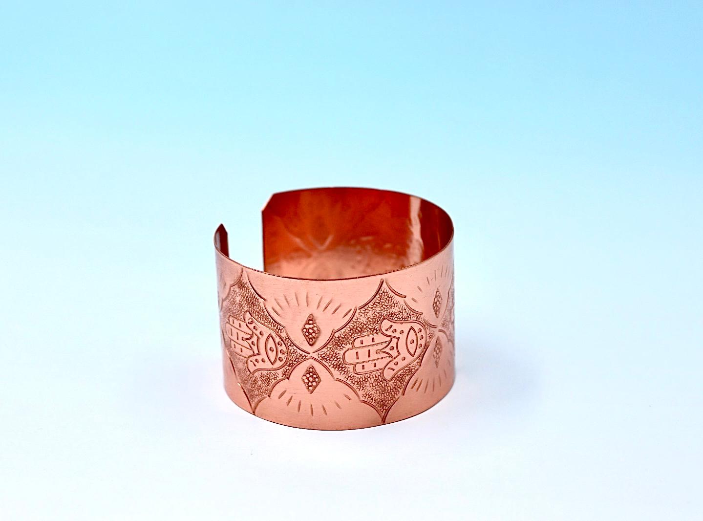 copper bracelets with Hamsa