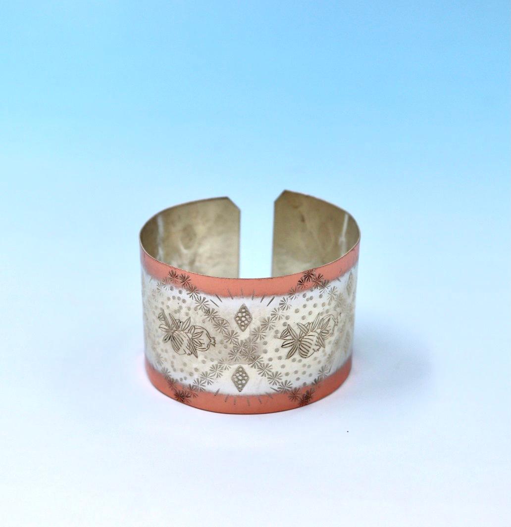 copper bracelet with pomegranates. partly silver-plated.