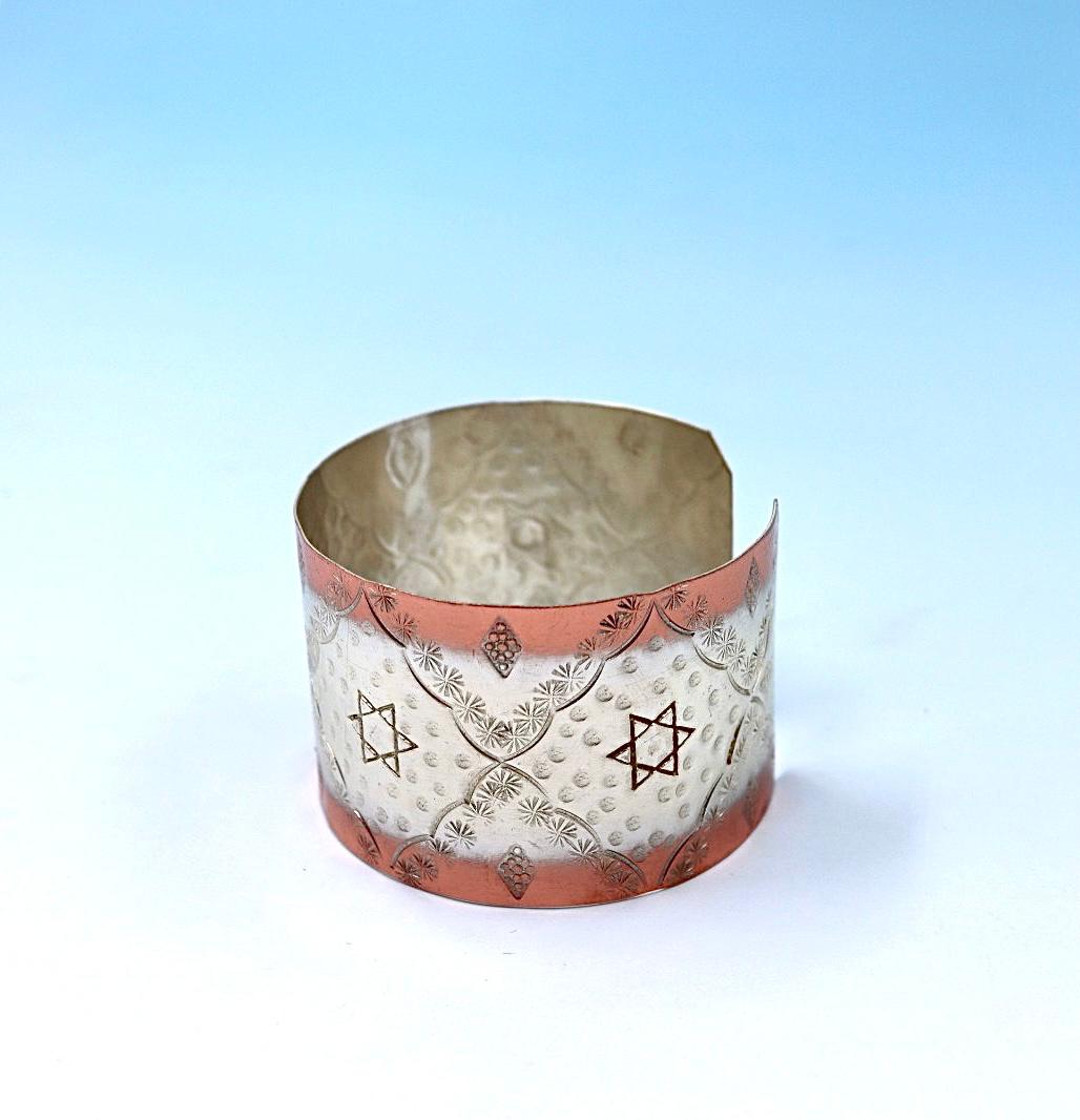 copper bracelet with Star of David. partly silver-plated.