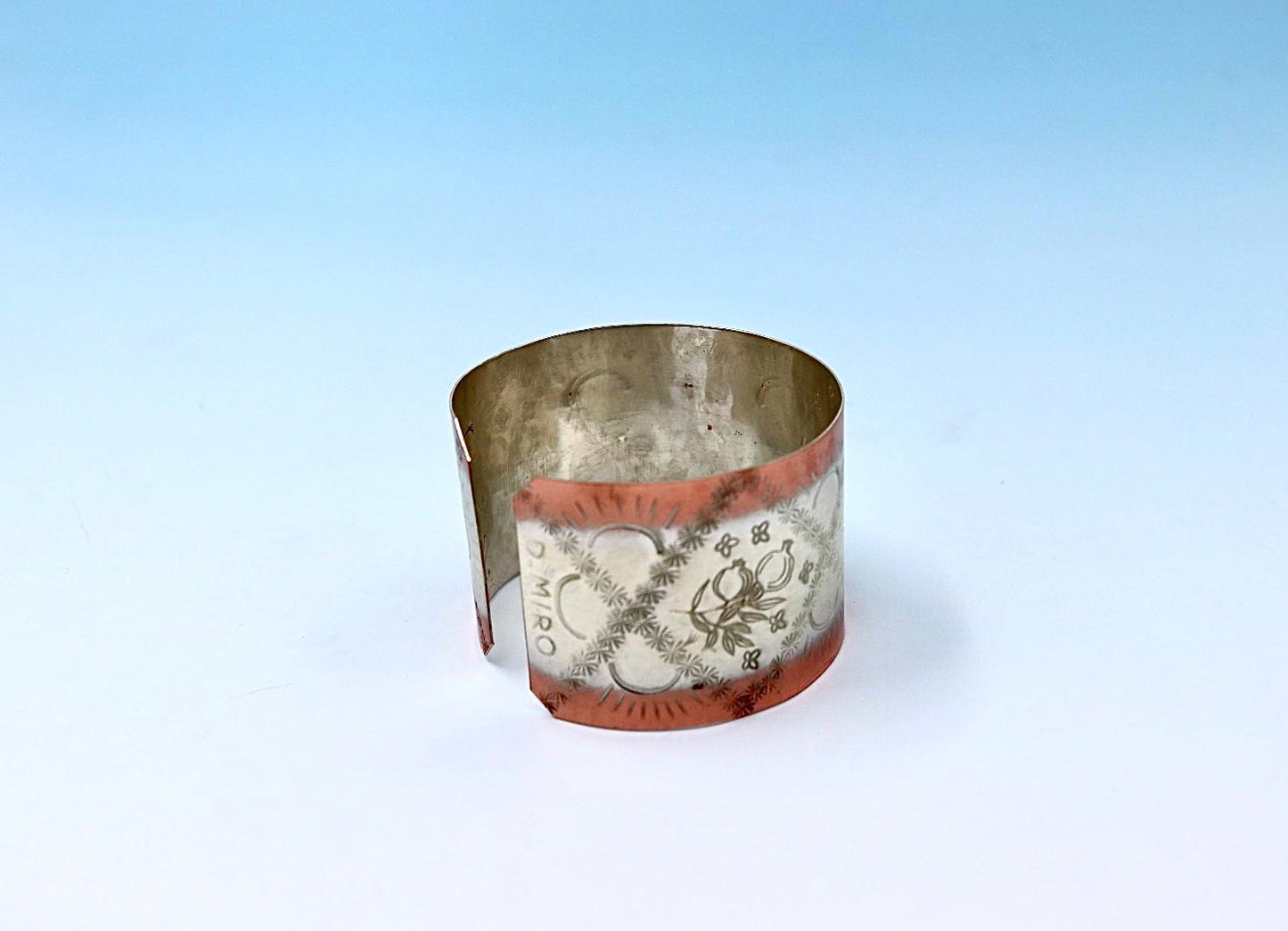 copper bracelet with pomegranates, partly silver-plated.