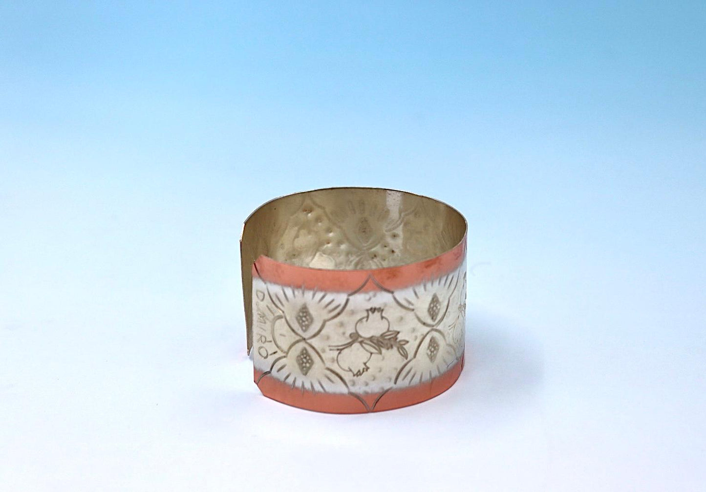 copper bracelet with pomegranates, partly silver-plated.