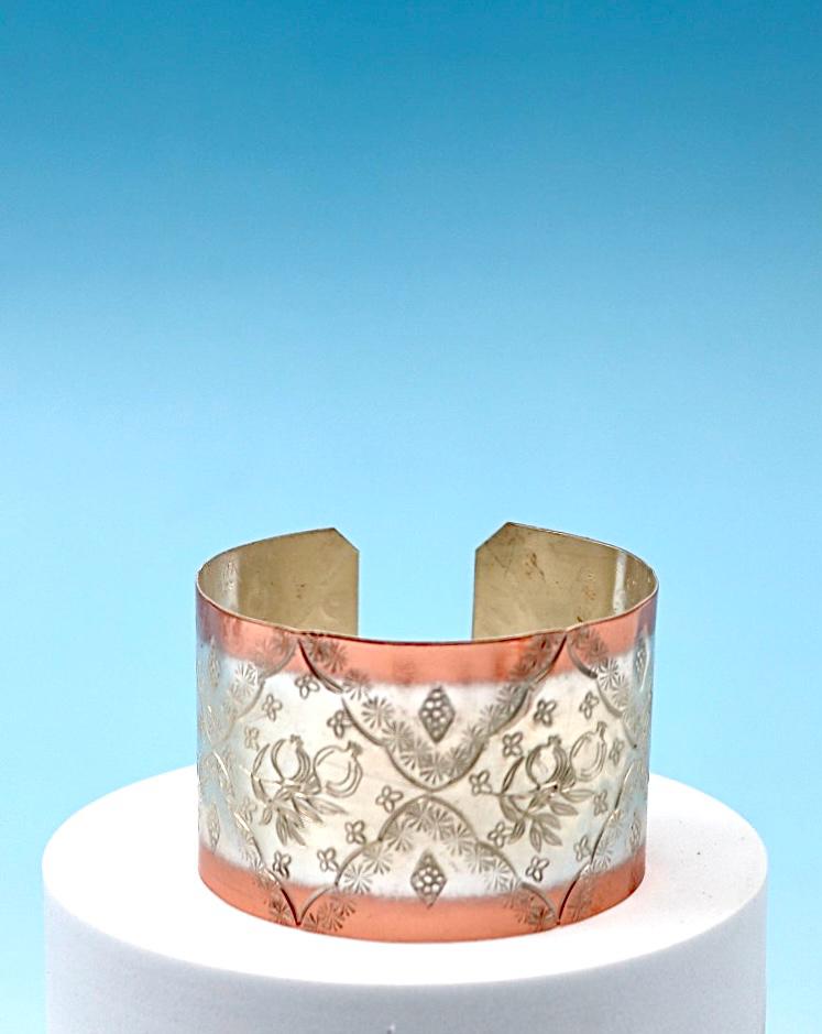 copper bracelet with pomegranates, partly silver-plated.