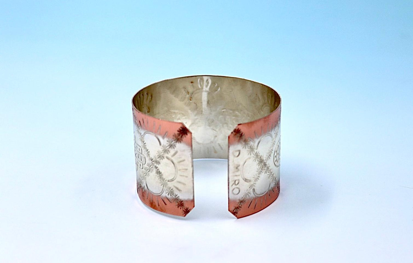 copper bracelet with Hamsa, partly silver plated.