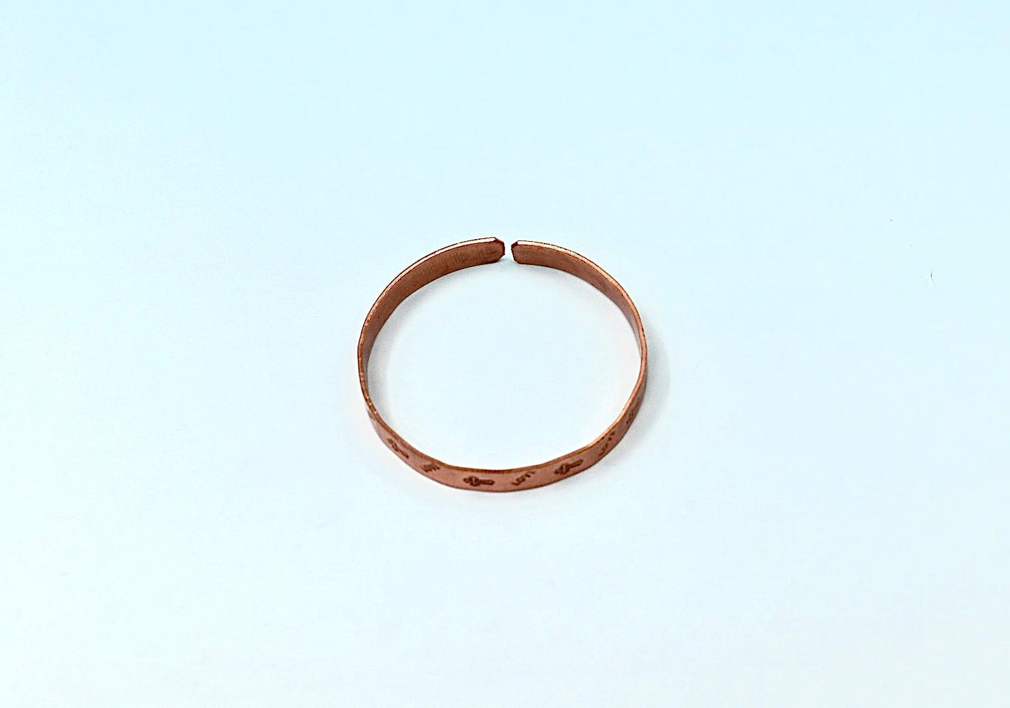 copper bracelet with cross