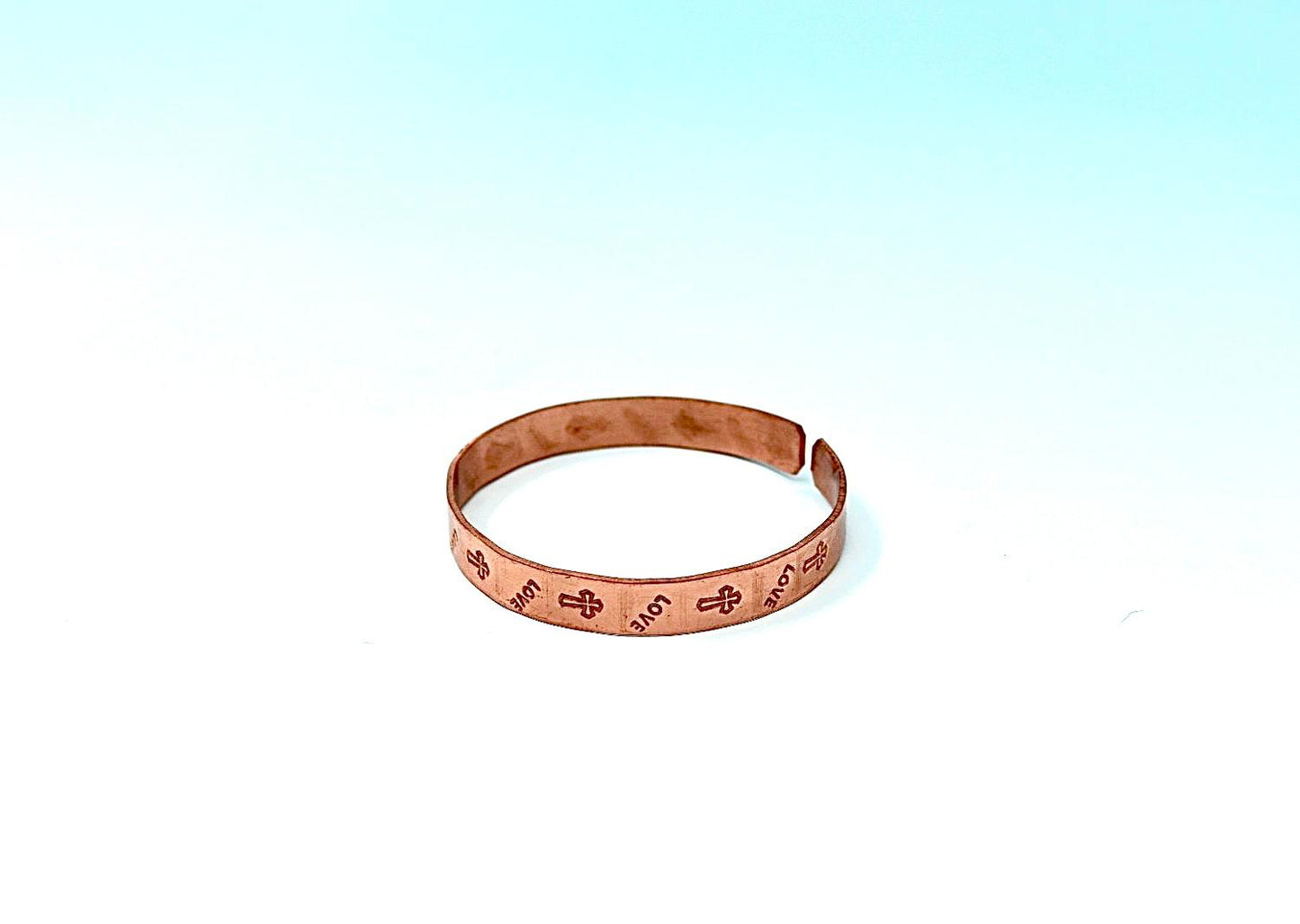 copper bracelet with cross