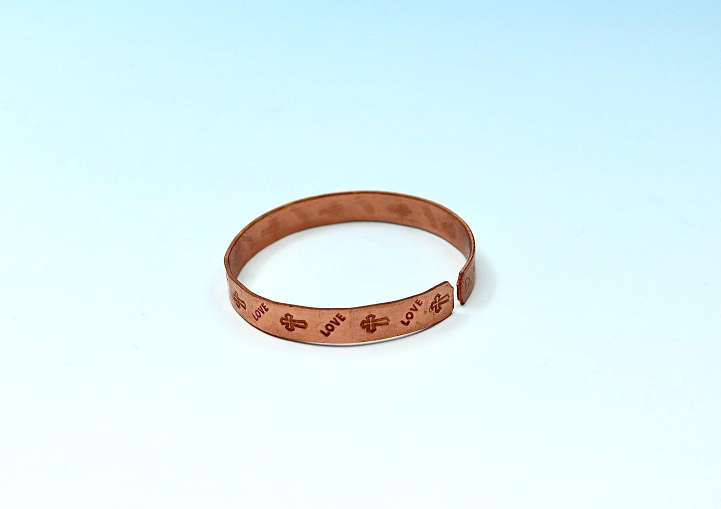 copper bracelet with cross