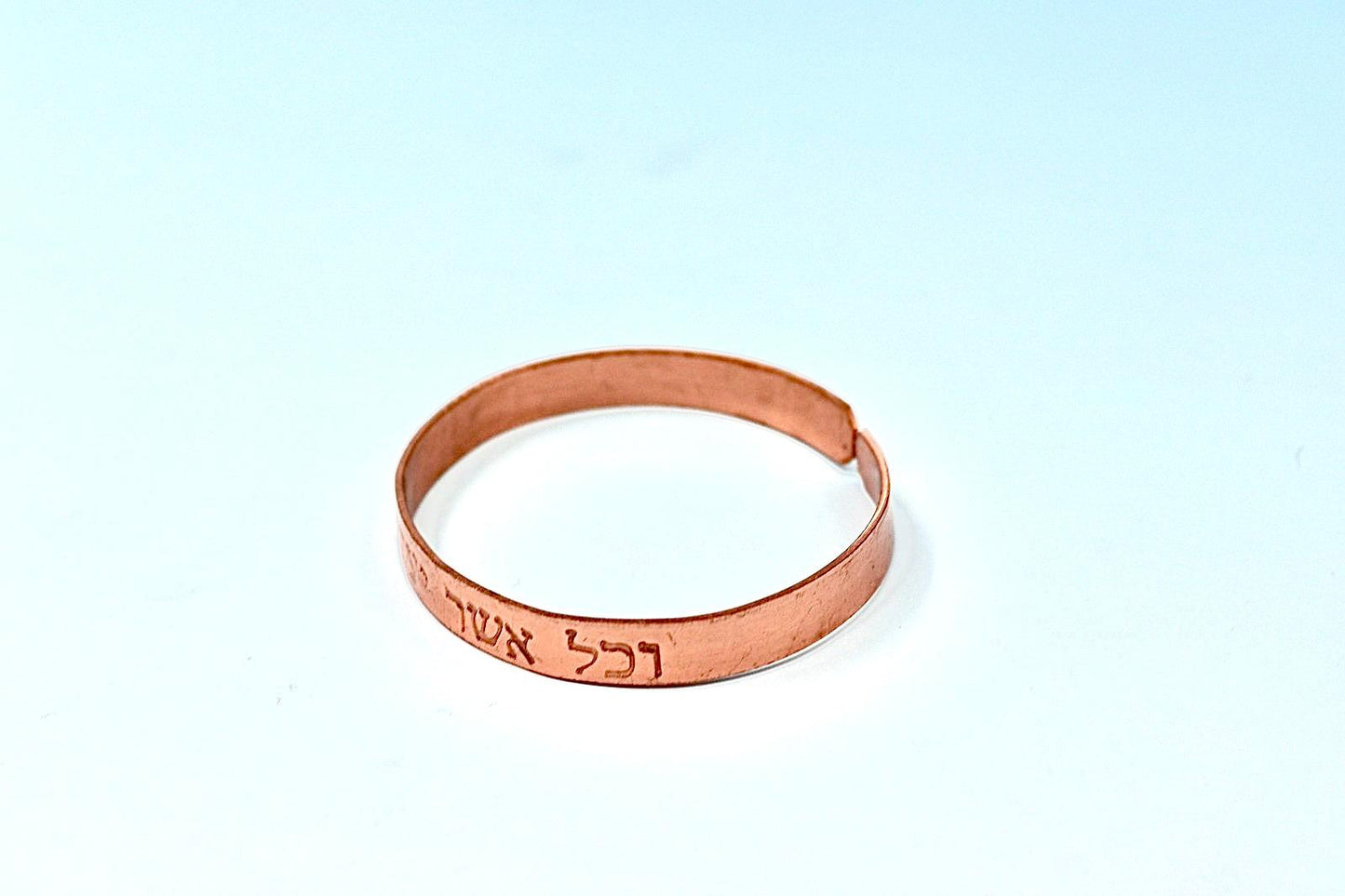 copper bracelet engraved "and in whatsoever he doeth he shall prosper" in Hebrew