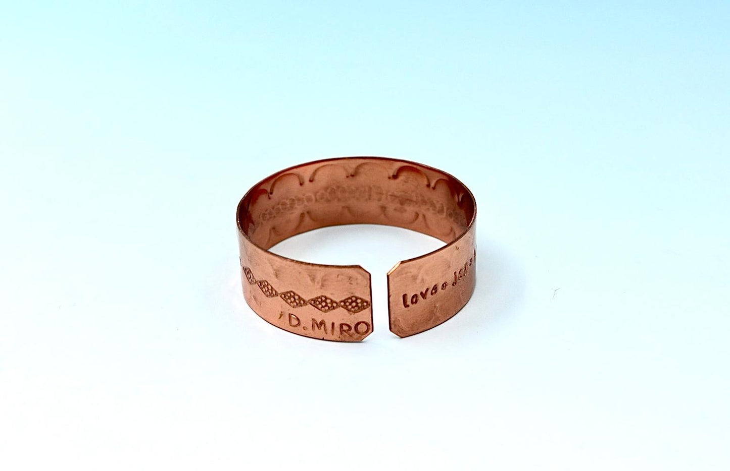 copper bracelet engraved with  seven blessings.